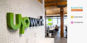 Upwork office interior with a large Upwork logo and open workspace, shown alongside Richmond Concept’s Expert-Vetted and Top Rated Plus badges.